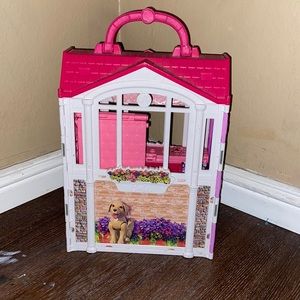 A Barbie dream house (pink)